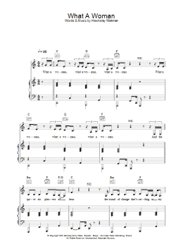 page one of What A Woman (Piano, Vocal & Guitar Chords)