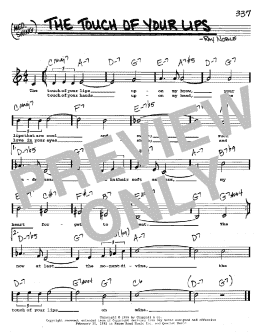 page one of The Touch Of Your Lips (Real Book – Melody, Lyrics & Chords)