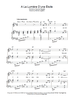 page one of A La Lumiere D'une Etoile (Piano, Vocal & Guitar Chords)