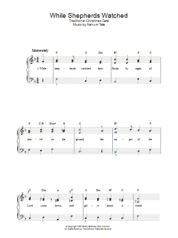 page one of While Shepherds Watched (Piano, Vocal & Guitar Chords)