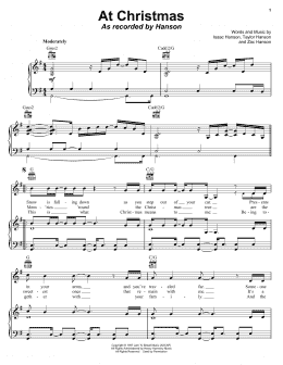 page one of At Christmas (Piano, Vocal & Guitar Chords (Right-Hand Melody))